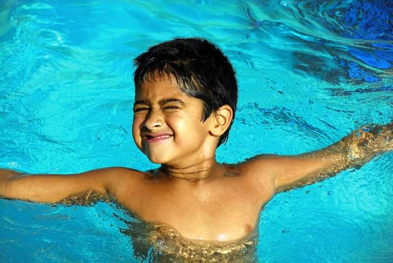 Boy in Heated Swimming Pool in Private Bangalore Bungalow